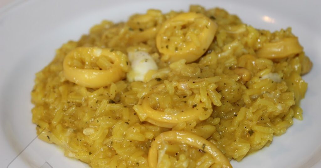 Risotto con calamari, gamberi, burrata e menta